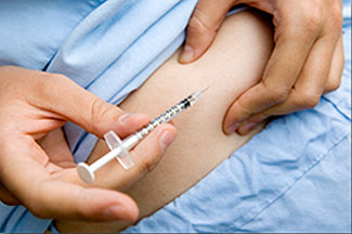 A patient receives an injection